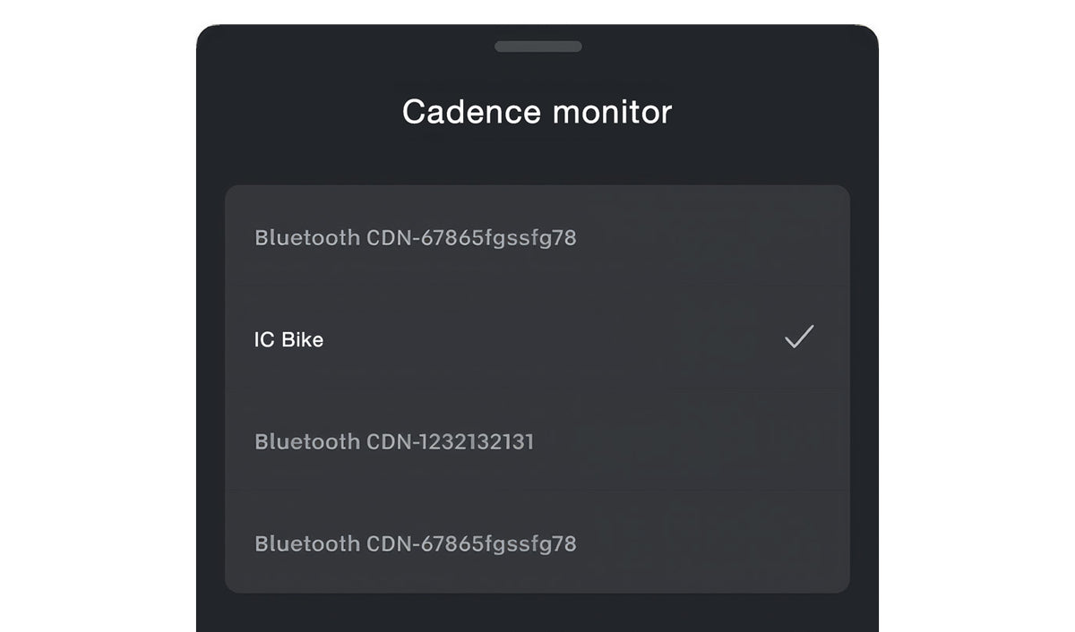 Peloton app screen titled 'Cadence monitor' showing a list of Bluetooth devices, including 'IC Bike' with a checkmark.