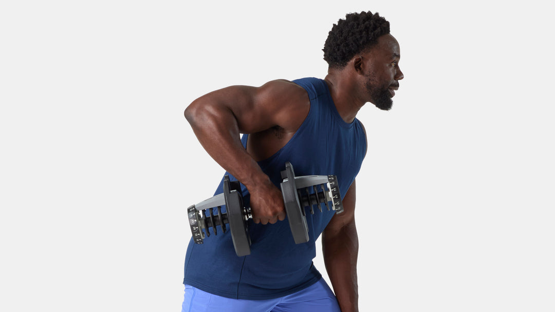 BowFlex Results Series 1090 SelectTech Dumbbells - Man doing a Triceps Exercise