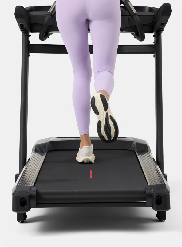 Person running on the BowFlex T16 Treadmill running path.
