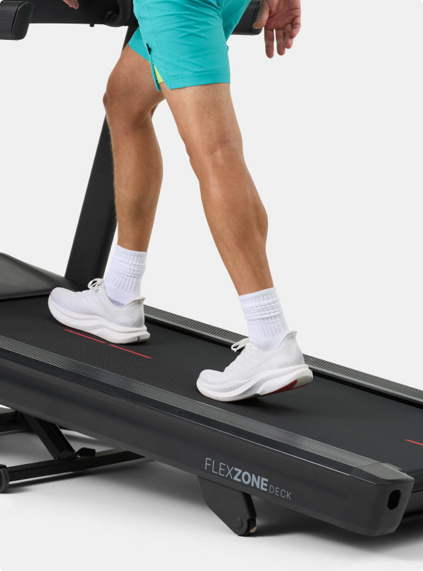 Person walking on the BowFlex T6 Treadmill Flex Zone Deck.