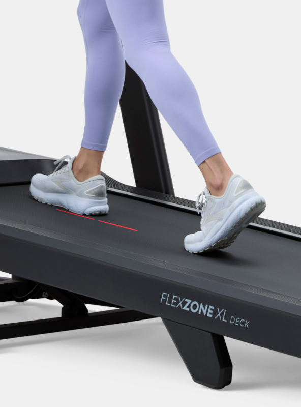 Person walking on the BowFlex T9 Treadmill Flex Zone Deck.